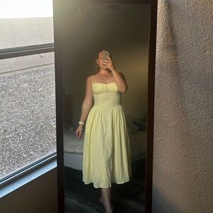 Women’s tea length yellow dress